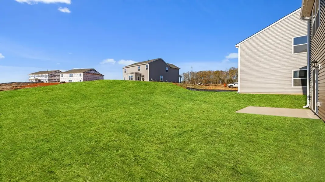 Exterior details and patio area of a home in Harper Ridge, Roebuck (Image 24).