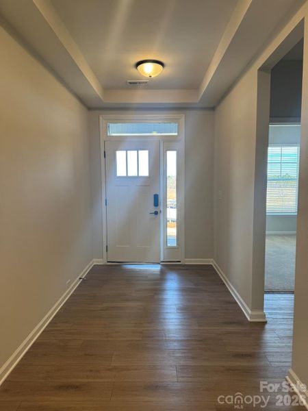 Two bedrooms and a full bath are next to foyer Two bedrooms and a full bath are next to foyer