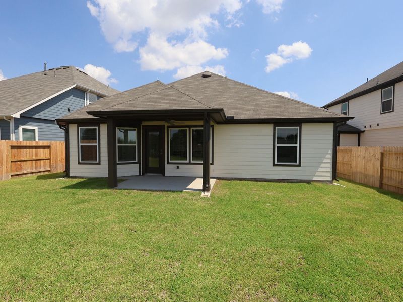 Front exterior of a new home in Summerview, Fulshear, TX, highlighting curb appeal (Image 15). Front exterior of a new home in Summerview, Fulshear, TX, highlighting curb appeal (Image 15).