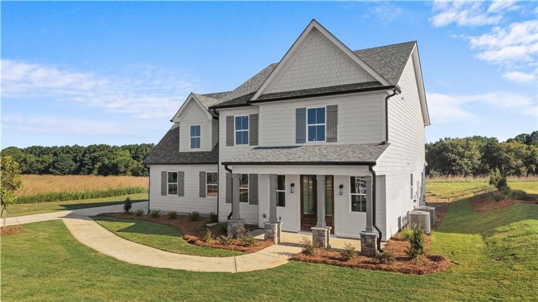 Front exterior of a new home in , Madison, GA, highlighting curb appeal (Image 29). Front exterior of a new home in , Madison, GA, highlighting curb appeal (Image 29).
