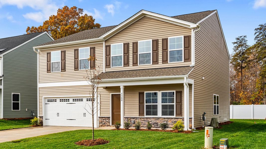 Front exterior of a new home in Hanes Lake, Winston-Salem, NC, highlighting curb appeal (Image 2).