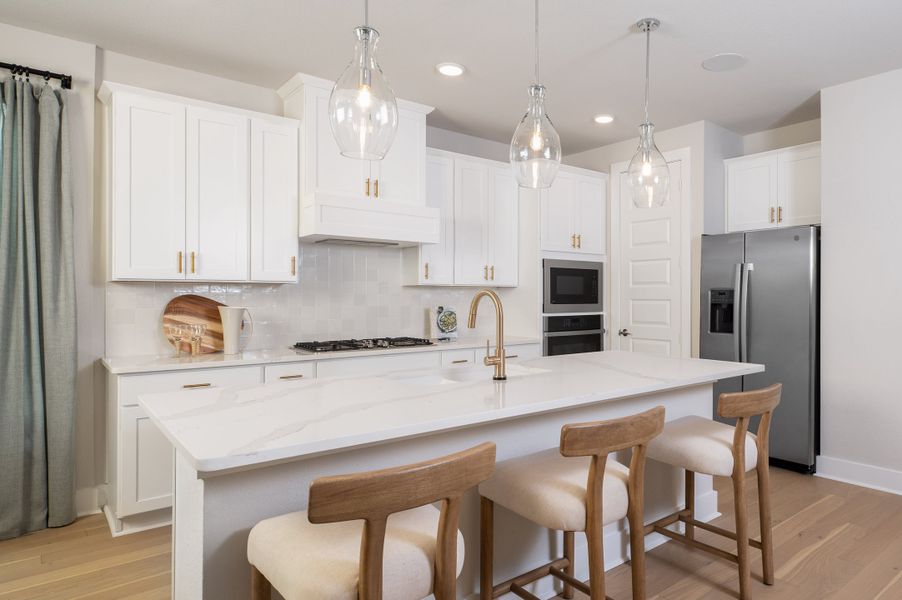 Representative furnished interior of a home built from the Sage by Tri Pointe Homes in The Retreat at Harvest, Argyle (Image 4).