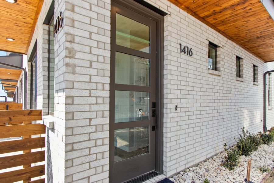 Exterior details and patio area of a home in Willow Grove Townhomes, Melissa (Image 2). Exterior details and patio area of a home in Willow Grove Townhomes, Melissa (Image 2).