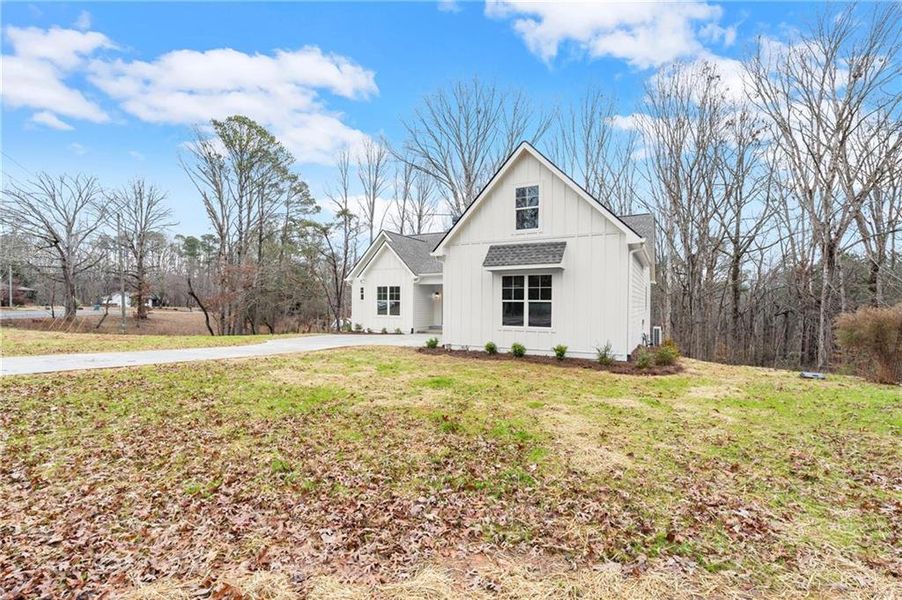 Front exterior of a new home in , Waleska, GA, highlighting curb appeal (Image 21). Front exterior of a new home in , Waleska, GA, highlighting curb appeal (Image 21).