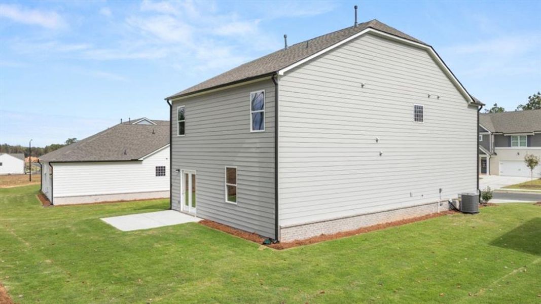 Exterior details and patio area of a home in Parkside at Carter Grove, Cartersville (Image 3).