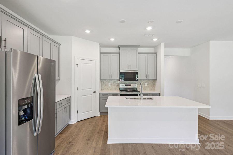 Photo is not of the actual home, but is an inspirational photo of builder’s model home and may depict options, furnishings, and/or decorator features that are not included