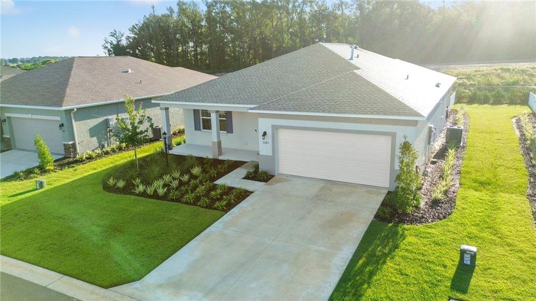 Front exterior of a new home in , Ocala, FL, highlighting curb appeal (Image 21).