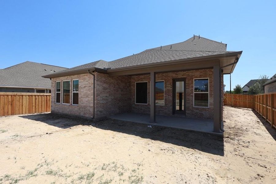 Front exterior of a new home in Dunham Pointe 50' Homesites, Cypress, TX, highlighting curb appeal (Image 17). Front exterior of a new home in Dunham Pointe 50' Homesites, Cypress, TX, highlighting curb appeal (Image 17).