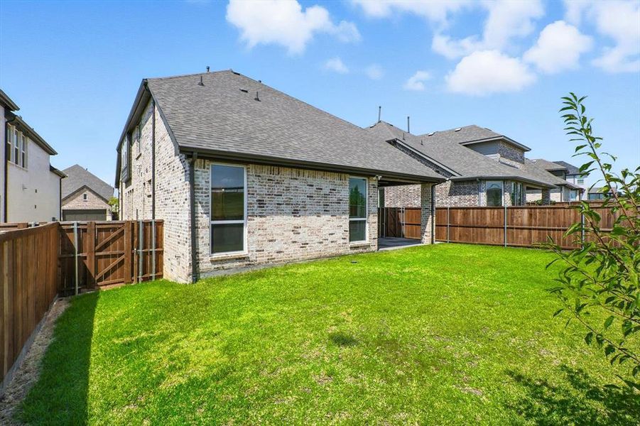 Front exterior of a new home in , Lewisville, TX, highlighting curb appeal (Image 2). Front exterior of a new home in , Lewisville, TX, highlighting curb appeal (Image 2).