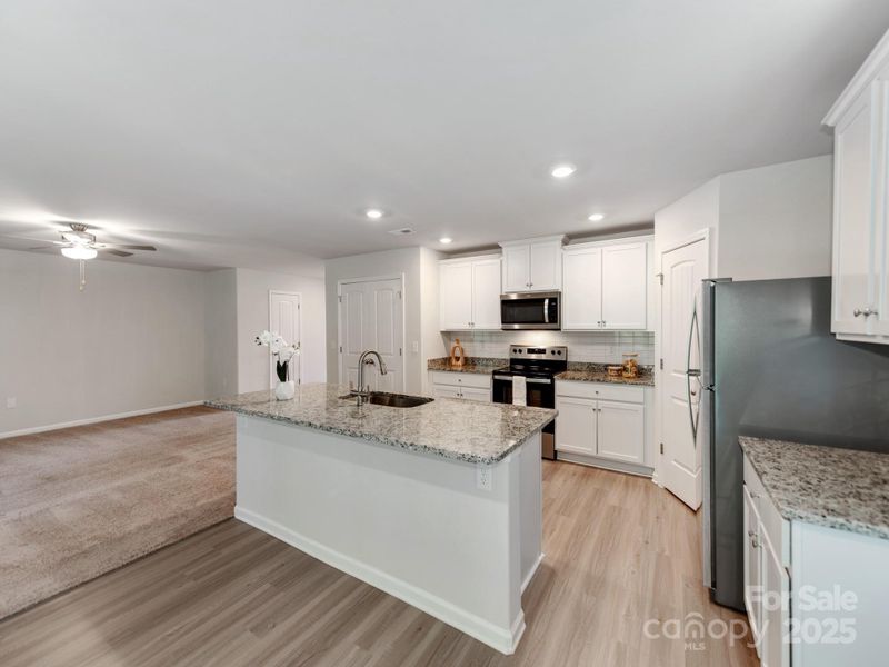 Furnished interior view inside a new home in McKee Creek Village, Charlotte (Image 10). Furnished interior view inside a new home in McKee Creek Village, Charlotte (Image 10).