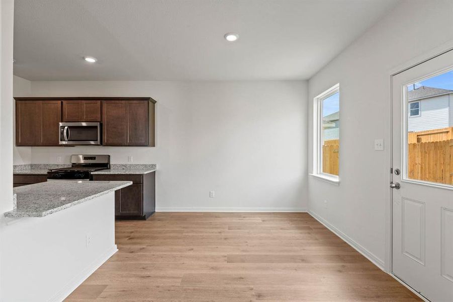 Dining room featuring light wood-type flooring