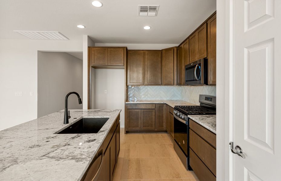 Representative furnished interior of a home built from the Rimini by Pulte Homes in Blossom Rock, Apache Junction (Image 9). Representative furnished interior of a home built from the Rimini by Pulte Homes in Blossom Rock, Apache Junction (Image 9).