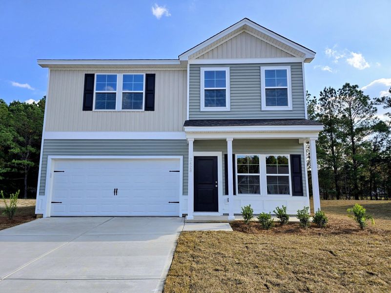 Front exterior of a new home in Hainer Place, Conway, SC, highlighting curb appeal (Image 1).