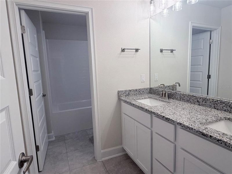 Furnished interior view inside a new home in Harmony Central, St. Cloud (Image 6).