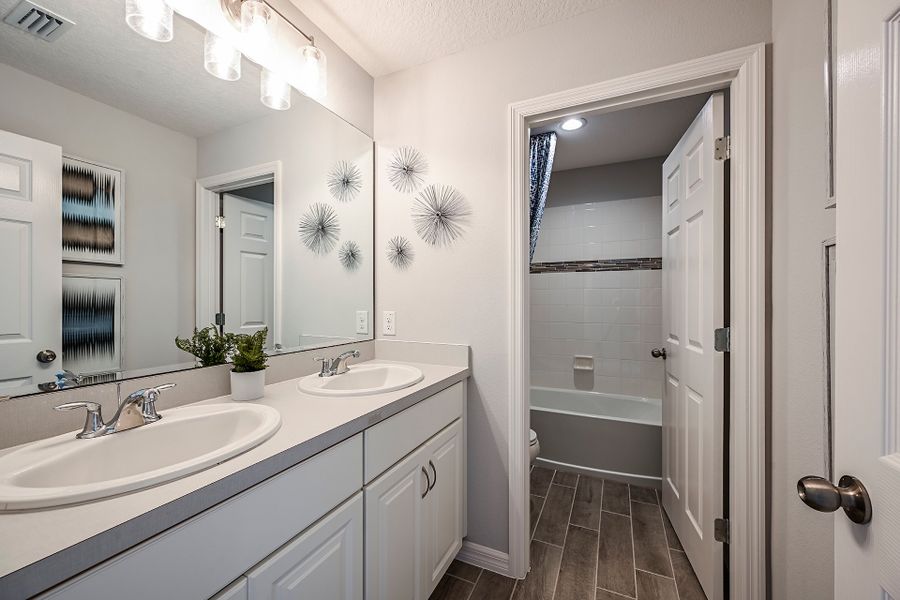 Representative furnished interior of a home built from the Sanibel by Risewell Homes in Preservation Pointe, Davenport (Image 6).