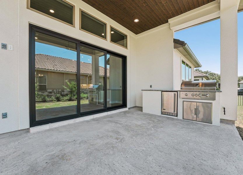 View of patio / terrace featuring exterior kitchen