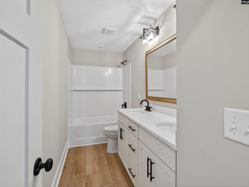 Furnished interior view inside a new home in Collins Cove, Chapin (Image 9).