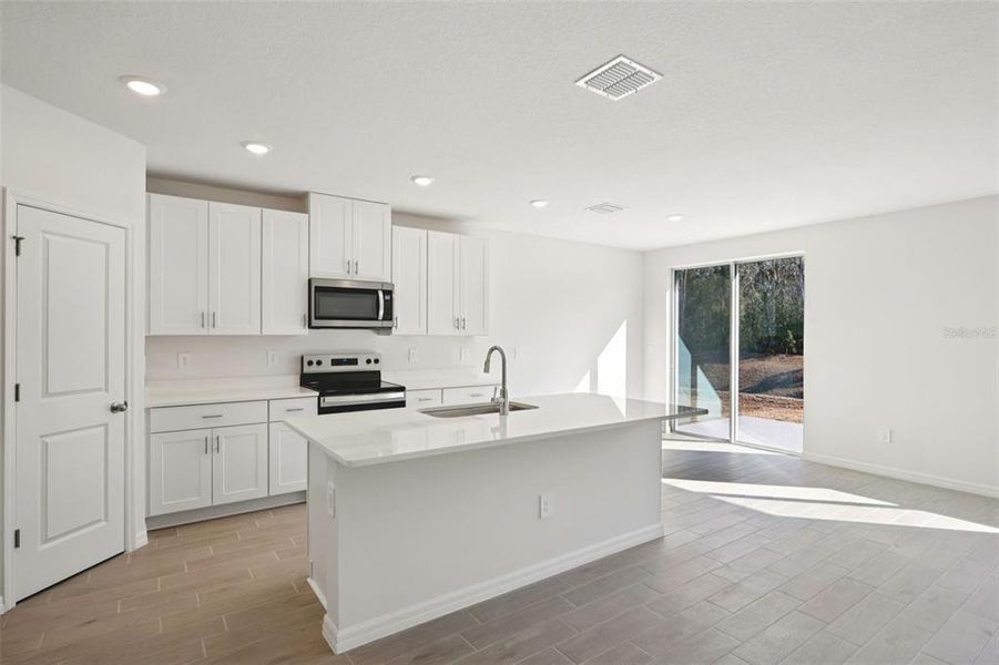 Furnished interior view inside a new home in Leyland Preserve - Classic Series, Brooksville (Image 9).