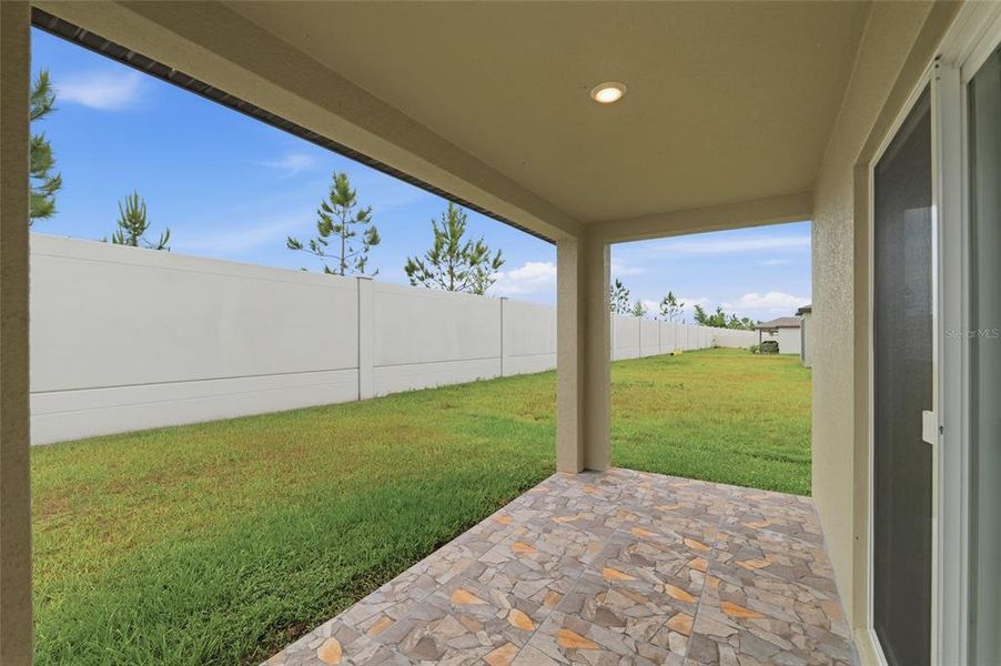 Exterior details and patio area of a home in , Zephyrhills (Image 24).