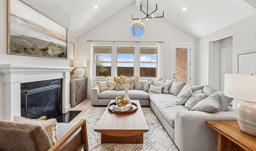 Great room with vaulted ceiling & white ceiling beams