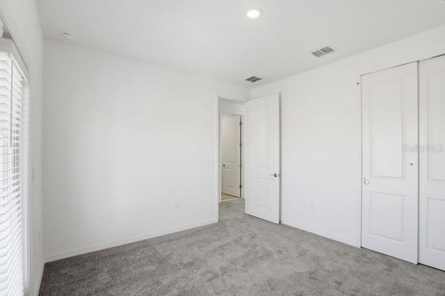 Spacious, unfurnished interior of a new home in Harvest at Ovation, Winter Garden (Image 19). Spacious, unfurnished interior of a new home in Harvest at Ovation, Winter Garden (Image 19).