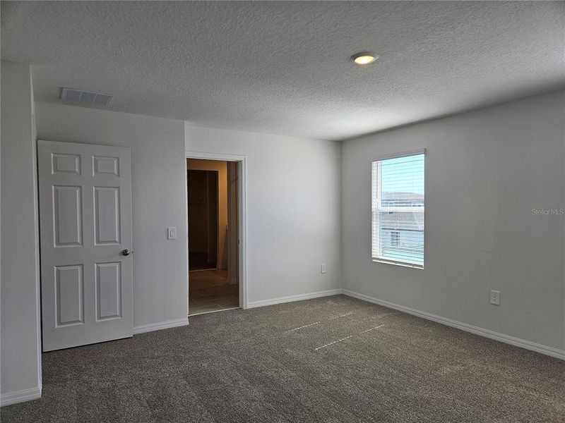 Spacious, unfurnished interior of a new home in Lawson Dunes - Signature Series, Haines City (Image 36).