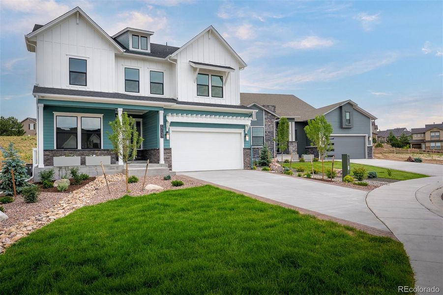 Front exterior of a new home in Cloverleaf – Mountainview Collection, Monument, CO, highlighting curb appeal (Image 1).