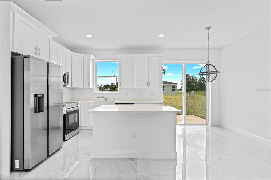 Furnished interior view inside a new home in , Dunnellon (Image 6).