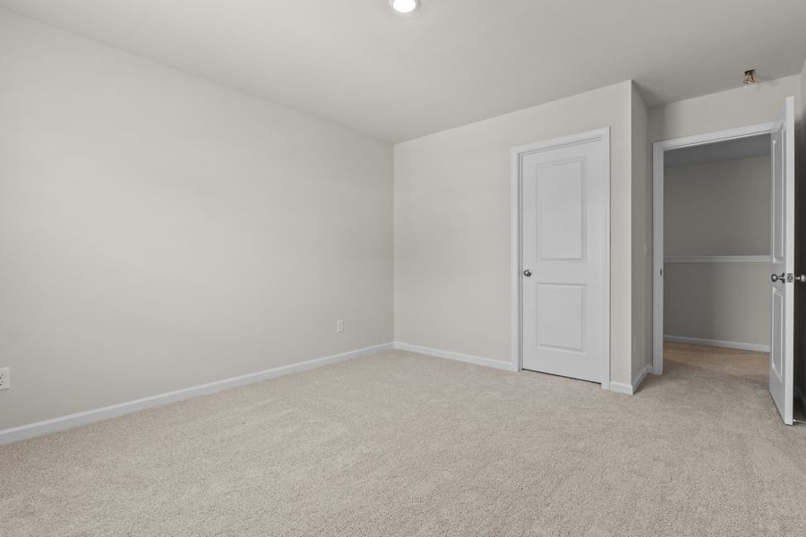 Spacious, unfurnished interior of a new home in Harmon Hill Estates, Hopkins (Image 24).