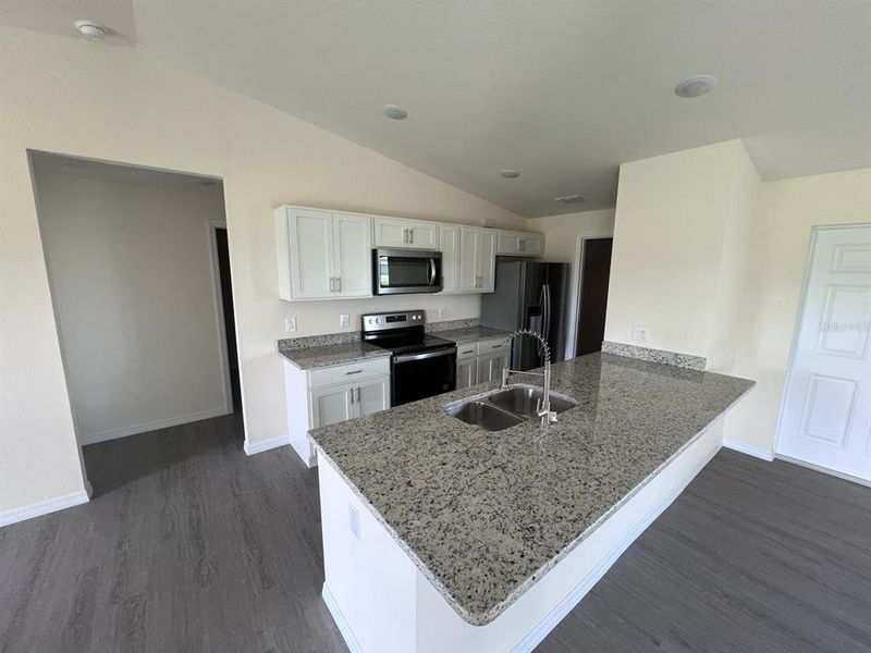 Furnished interior view inside a new home in , Dunnellon (Image 3).