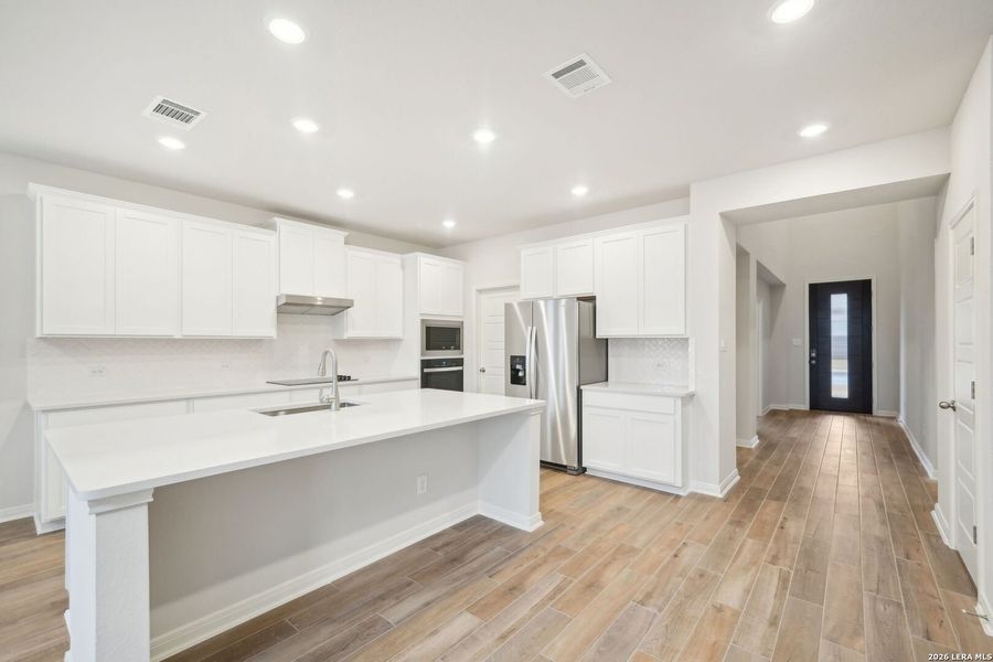 Furnished interior view inside a new home in Estancia Ranch - Classic Series, San Antonio (Image 11).