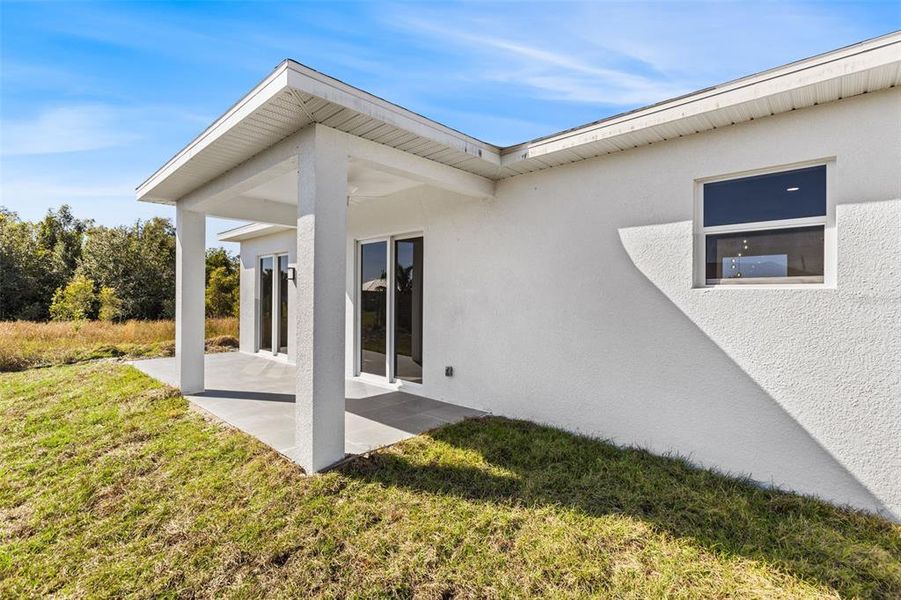 Exterior details and patio area of a home in , Lehigh Acres (Image 3).