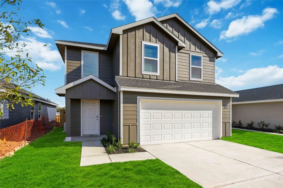 Front exterior of a new home in Legacy Village, Houston, TX, highlighting curb appeal (Image 1). Front exterior of a new home in Legacy Village, Houston, TX, highlighting curb appeal (Image 1).
