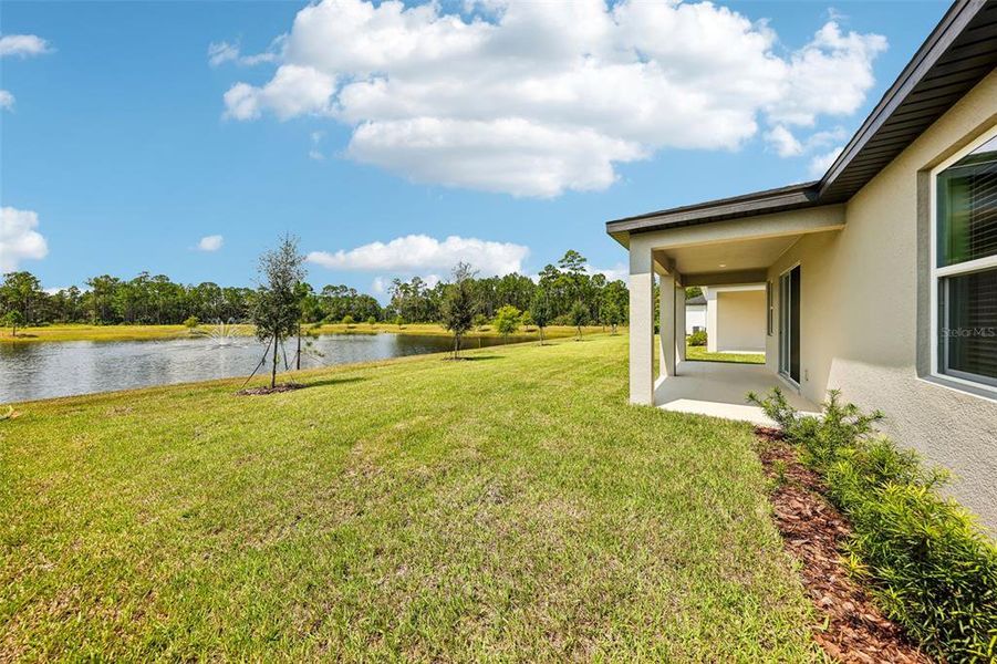 Exterior details and patio area of a home in Ridgehaven - Signature Series, Ormond Beach (Image 2). Exterior details and patio area of a home in Ridgehaven - Signature Series, Ormond Beach (Image 2).