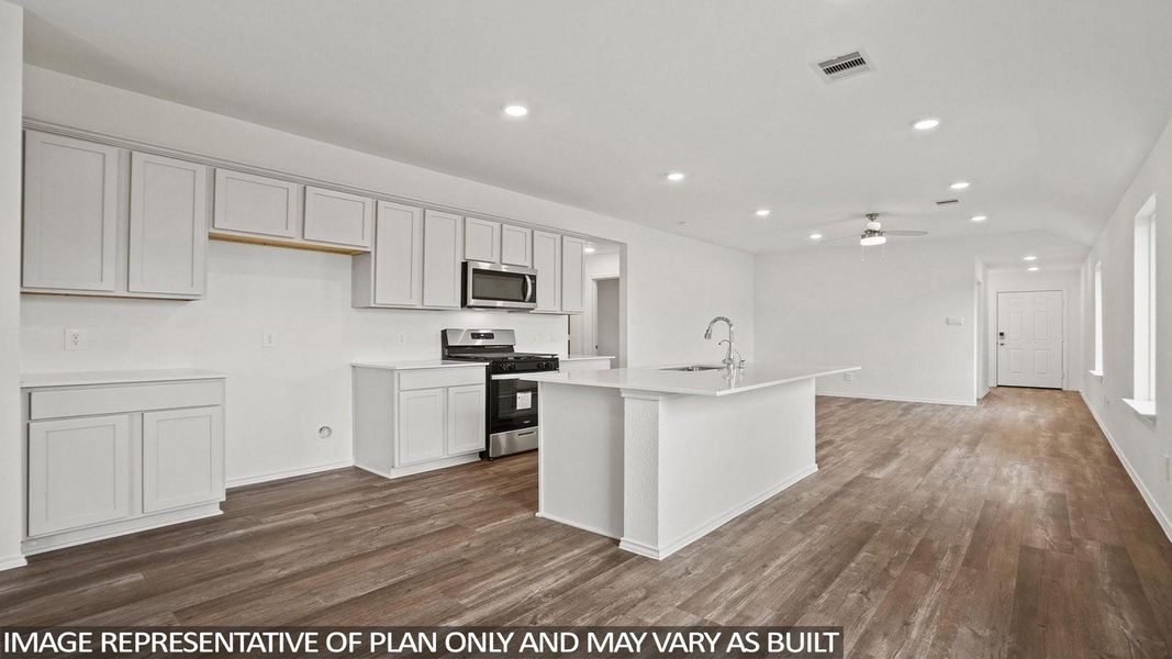 Furnished interior view inside a new home in Sunterra, Katy (Image 6).
