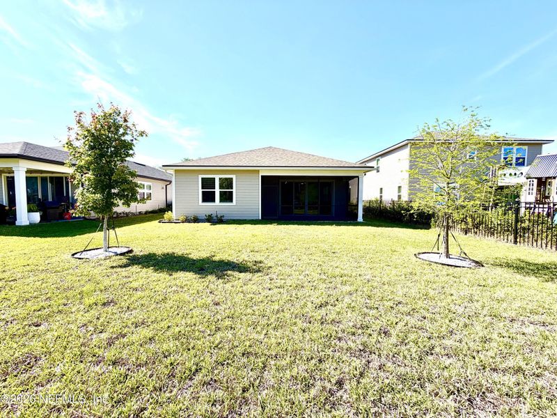 Exterior details and patio area of a home in Seasons at TrailMark, St. Augustine (Image 38).