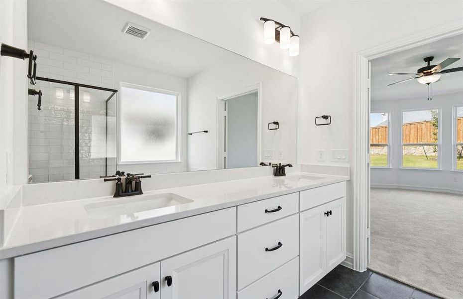 Double vanity in owner's bath Double vanity in owner's bath