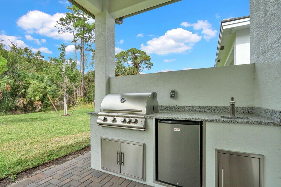 Exterior details and patio area of a home in Cove Royale, Stuart (Image 22).