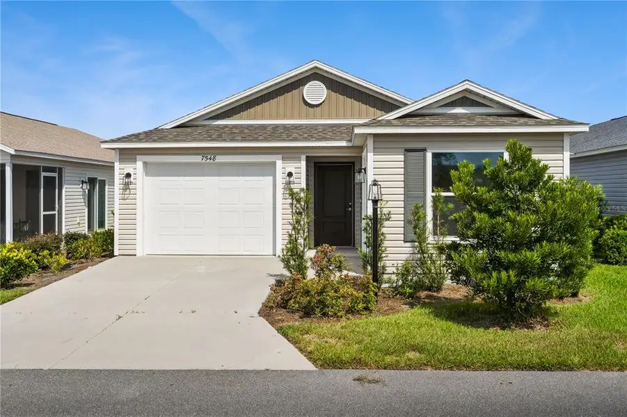 Front exterior of a new home in , The Villages, FL, highlighting curb appeal (Image 19). Front exterior of a new home in , The Villages, FL, highlighting curb appeal (Image 19).