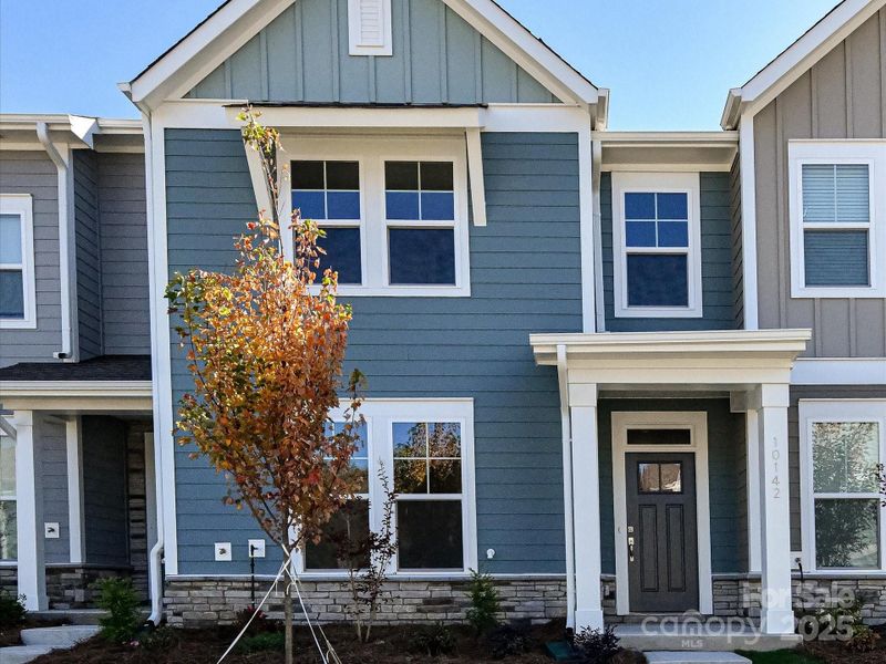 Exterior details and patio area of a home in North Creek Village, Huntersville (Image 21). Exterior details and patio area of a home in North Creek Village, Huntersville (Image 21).