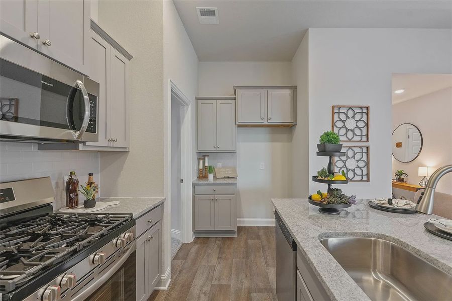 Furnished interior view inside a new home in Grand Oaks Reserve, Cleveland (Image 18).