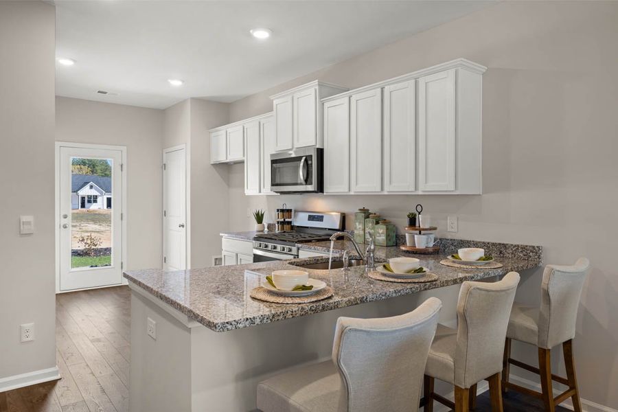 Representative furnished interior of a home built from the Calloway 3 by D.R. Horton in Byrd Village, Graniteville (Image 9).