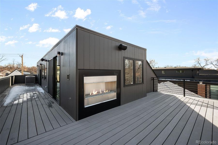 west side of deck with gas fireplace