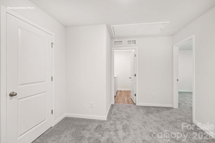 Spacious, unfurnished interior of a new home in Reedy Creek Preserve, Charlotte (Image 21).