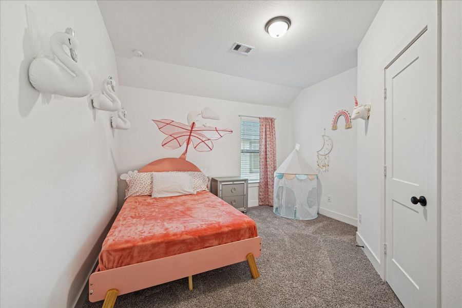 Furnished interior view inside a new home in , Conroe (Image 15).