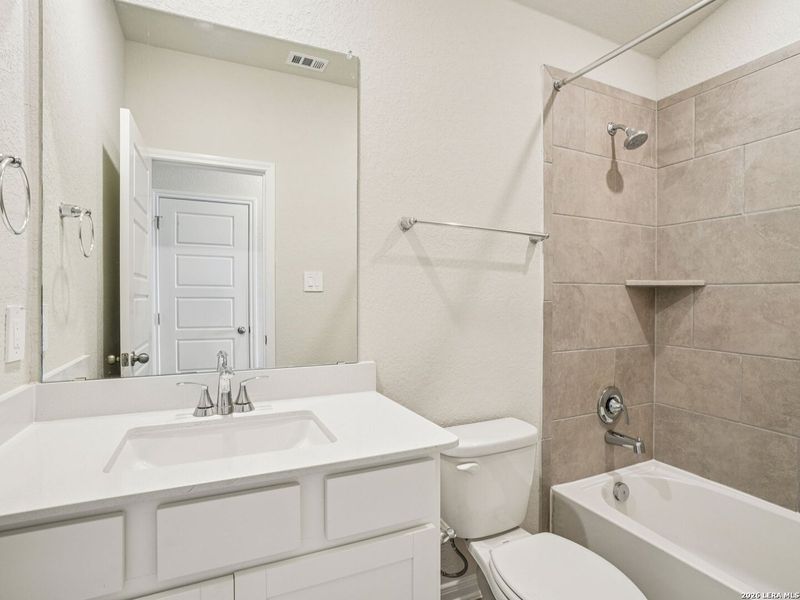 Furnished interior view inside a new home in Legendary Trails - Premier Series, Cibolo (Image 6).
