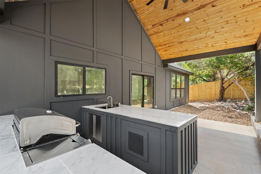 View of patio / terrace featuring a grill and a sink View of patio / terrace featuring a grill and a sink