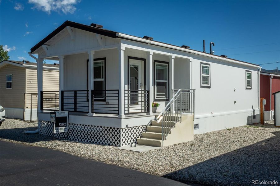 Front exterior of a new home in , Salida, CO, highlighting curb appeal (Image 16).