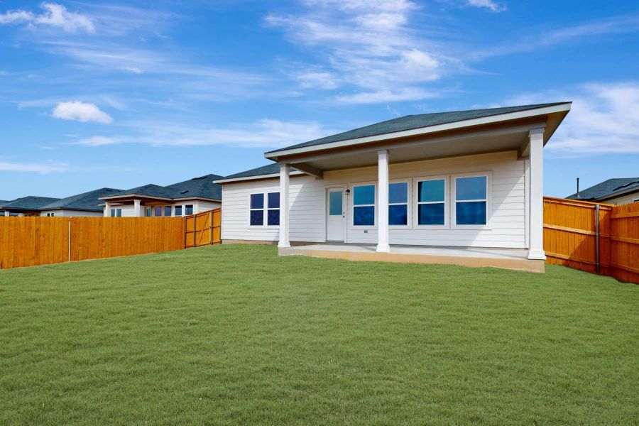 Exterior details and patio area of a home in Carillon, Manor (Image 20).