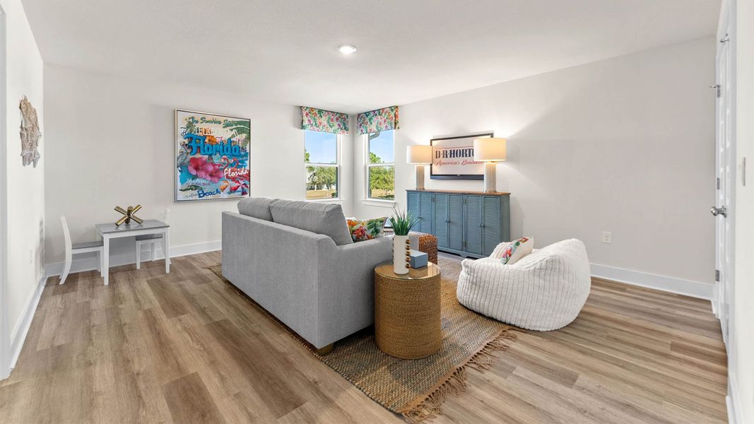 Representative furnished interior of a home built from the The Alabaster by D.R. Horton in WindMark Beach, Port Saint Joe (Image 25).